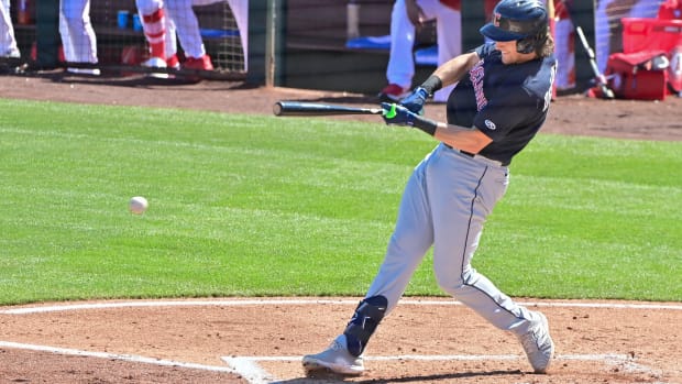 Feb 29, 2024; Tempe, Arizona, USA; Cleveland Guardians right fielder Chase DeLauter (6) grounds out in the third inning against the Los Angeles Angels during a spring training game at Tempe Diablo Stadium.